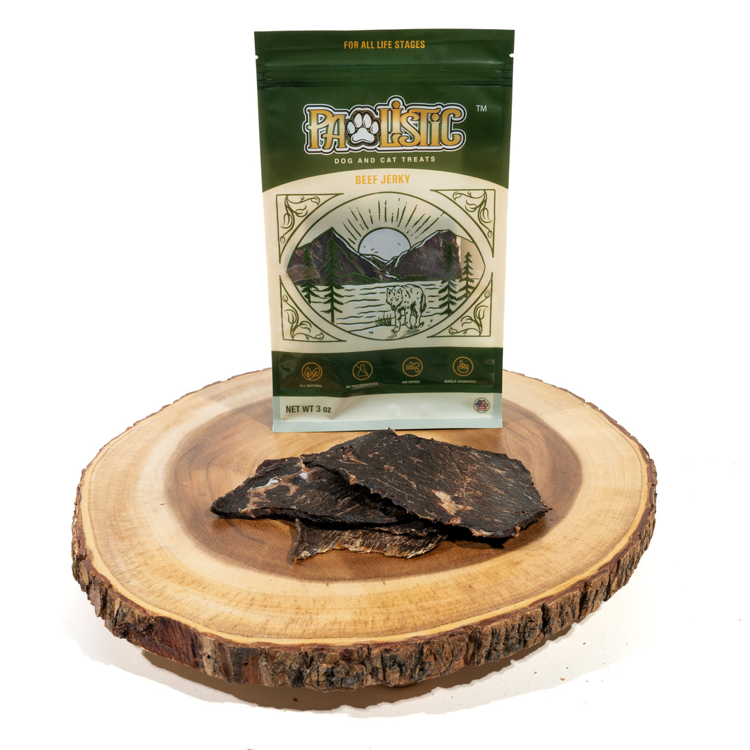 Image of Pawlistic Beef Jerky Treats for dogs and cats, displayed attractively in front of the packaging. The all-natural jerky pieces highlight their high-protein content and emphasize the nutritious benefits and delicious flavor that pets will love.