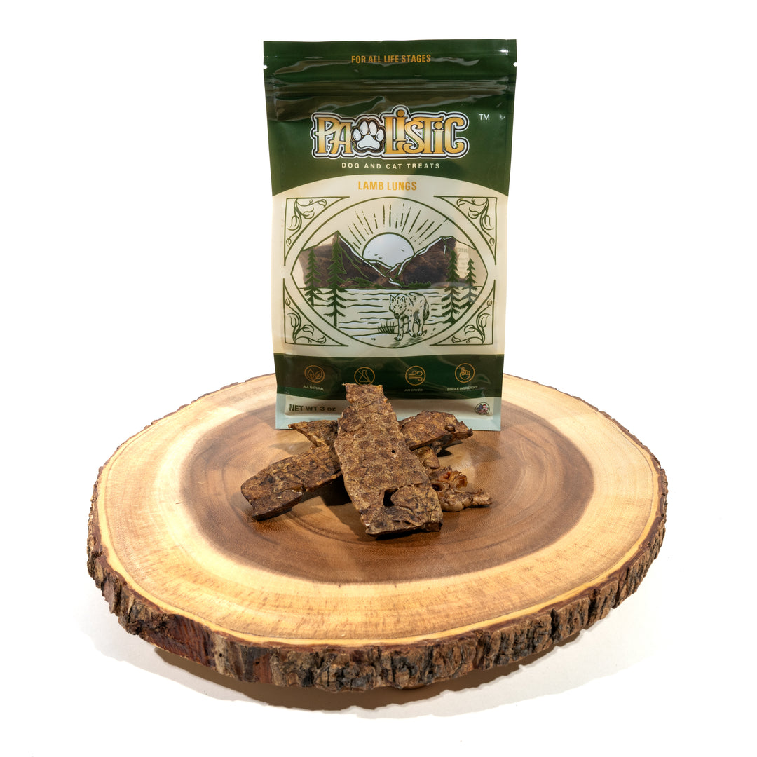 Image of Pawlistic Lamb Lungs treats for dogs and cats, displayed attractively in front of the packaging. These all-natural, single-ingredient treats highlight their high-protein content and nutritional benefits, making them an appealing choice for pet owners seeking healthy options.